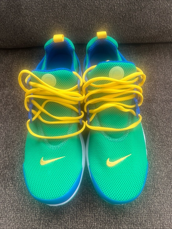 Nike Kids Teal Mesh Sneakers with Bright Yellow Accents